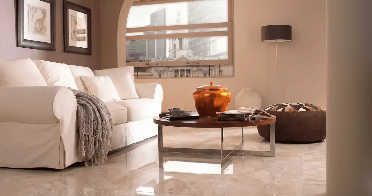 Modern living room with professionally installed marble flooring, a beige sofa, coffee table in Naperville, IL