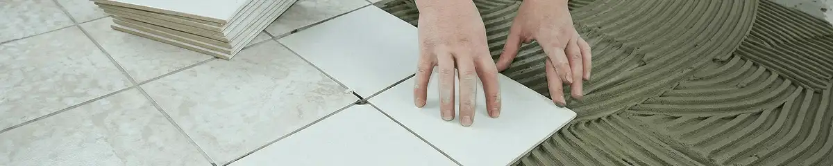 Professional installing white tile floors in Naperville, IL