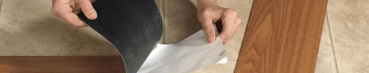 A professional installing vinyl flooring in Naperville, IL