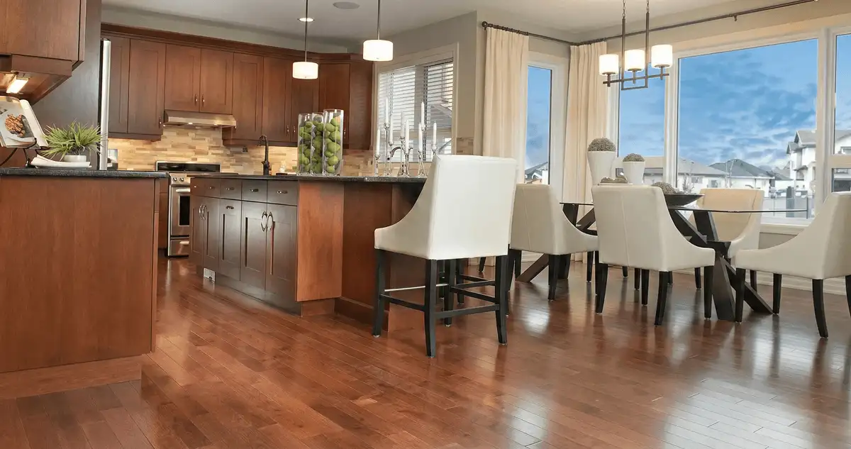 A modern kitchen with professionally installed wood flooring in Naperville, IL